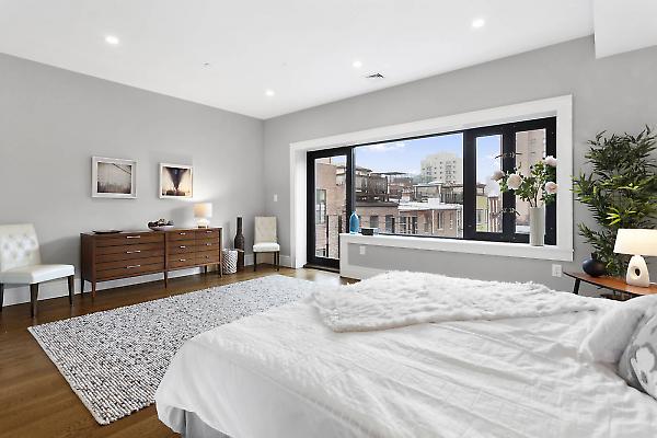 master bedroom with balcony door