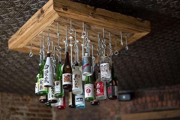 sake bottle chandelier by day