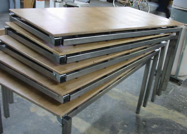 stacked tables with corner leg in upright position