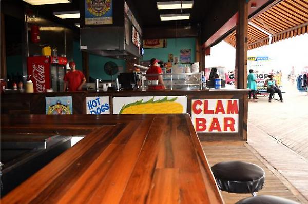 view of bar and boardwalk