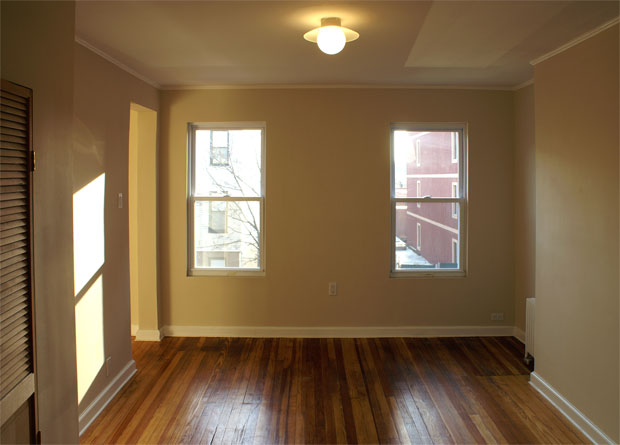 upstairs living area with restored wood floors