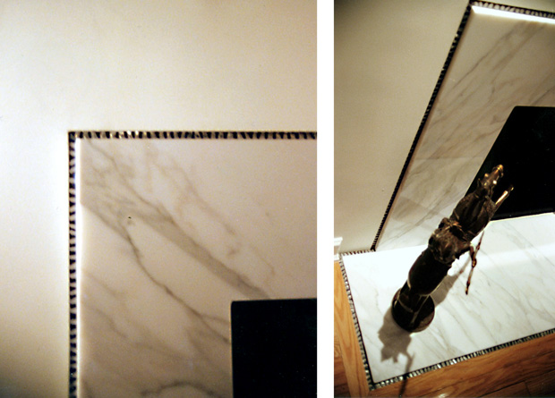 collagata marble fireplace with decorative metal trim